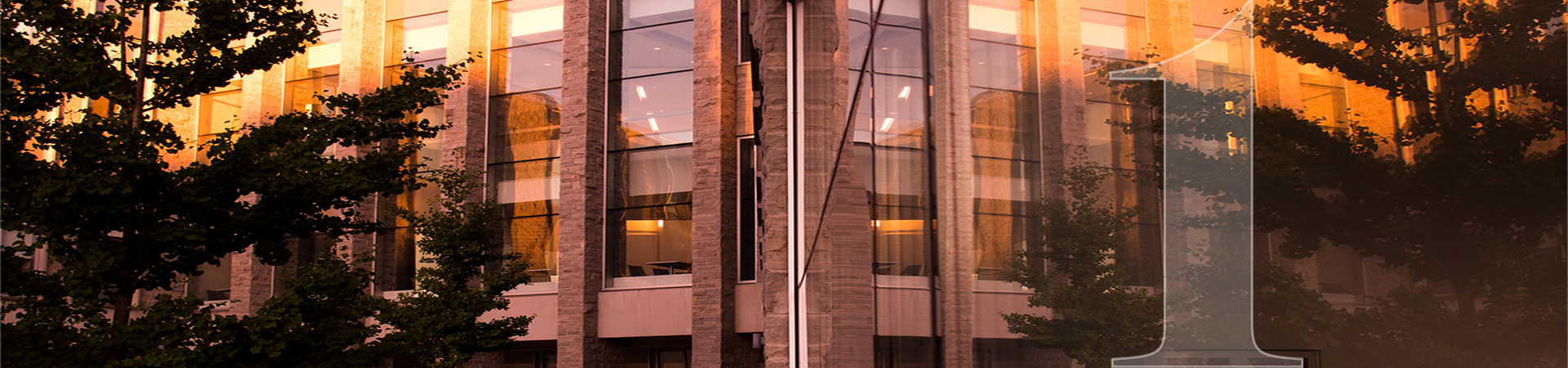 FIMS and Nursing building reflection in glass