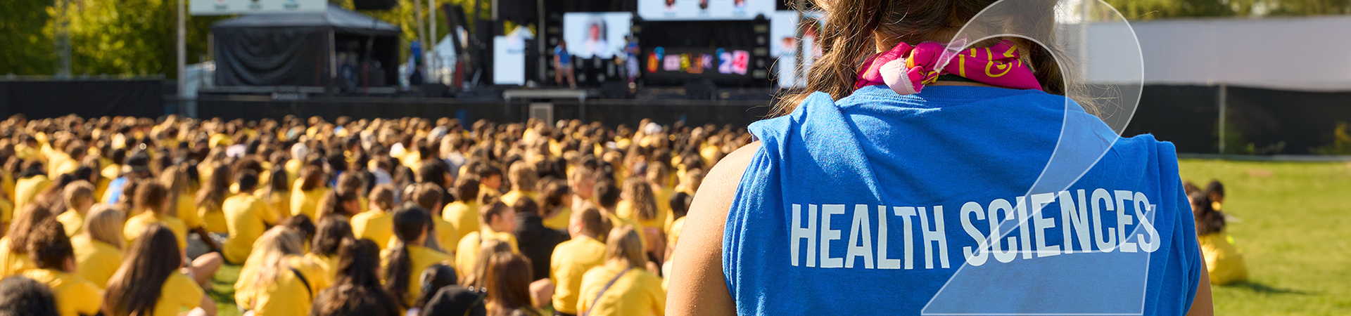Faculty of Health Sciences student leader overlooking student experience event