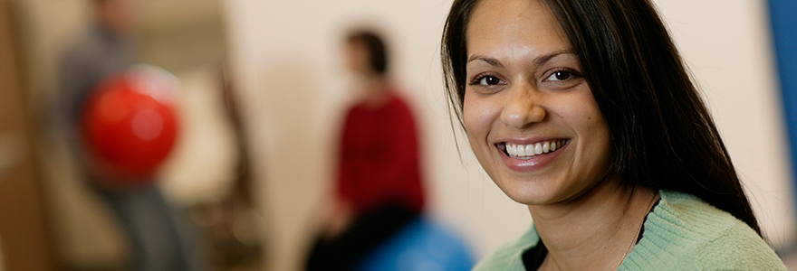 A student smiling for their picture