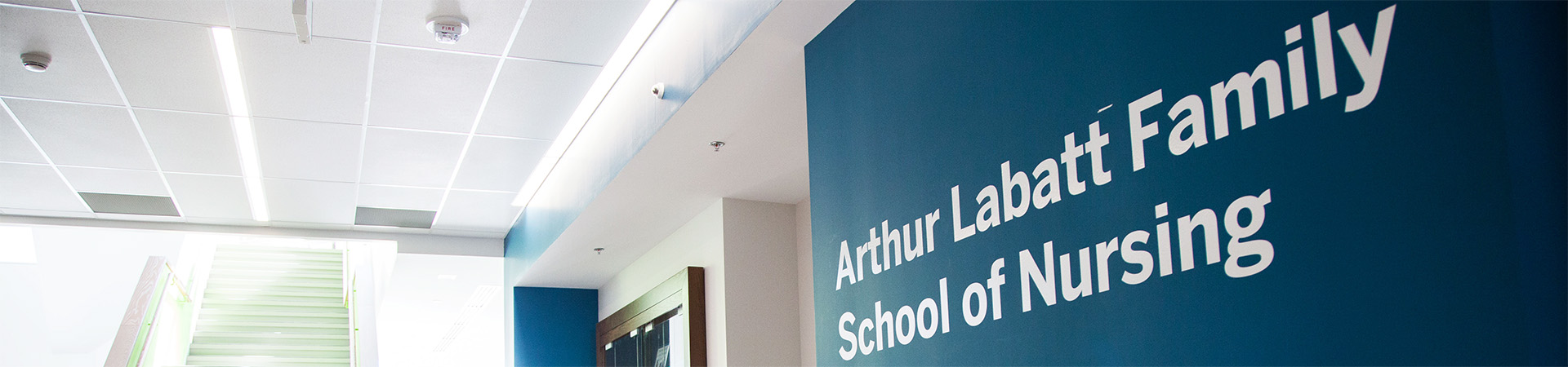 Interior view of the FIMS and Nursing building, showcasing a wall that says "Arthur Labatt Family School of Nursing."