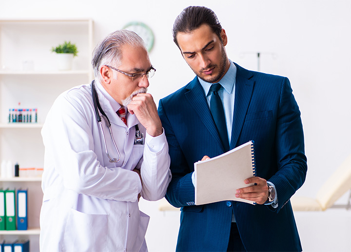 Two healthcare professionals having a discussion.