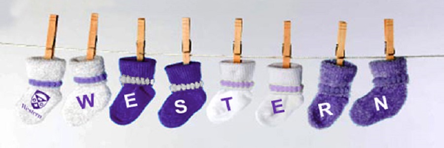 Baby socks on a clothes line spelling Western