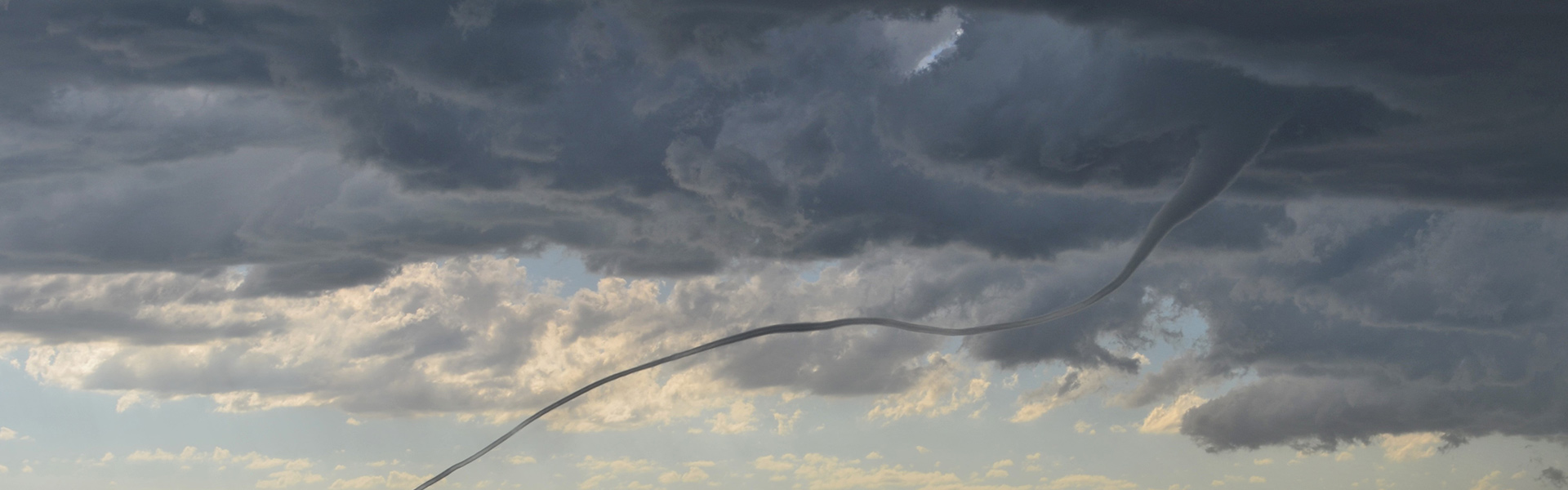 storm clouds over road
