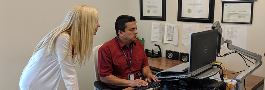 Clinical team sharing a computer screen