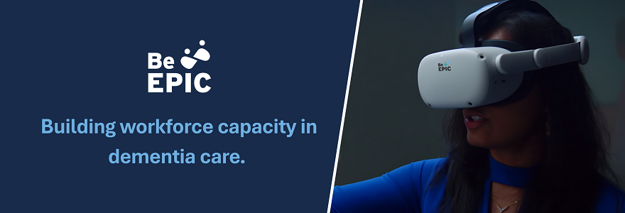Be EPIC-VR - Building workforce capacity. The image is split: the righ side shows a woman's head and shoulder from the side. She is wearing a light VR headset, focused and engaged, likely participating in a training. The woman has dark hair and wears a dark blue top. The left side includes a white Be EPIC logo on a dard blue background and a text promting 'Building workforce capacity in dementia care.'. On the right os a woman from side perspective wearing a VR headset, focused and engaged.