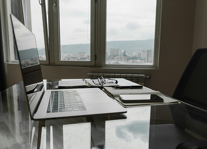 A laptop placed on a desk.