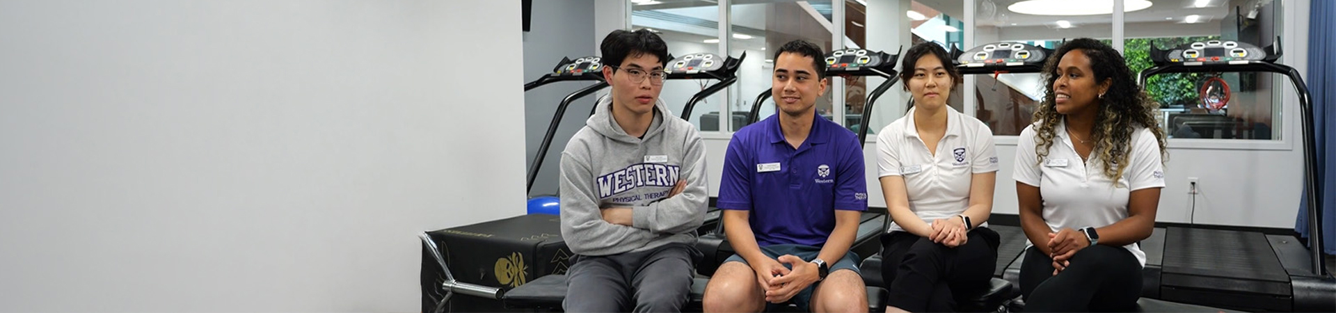 Four International Students sitting together.