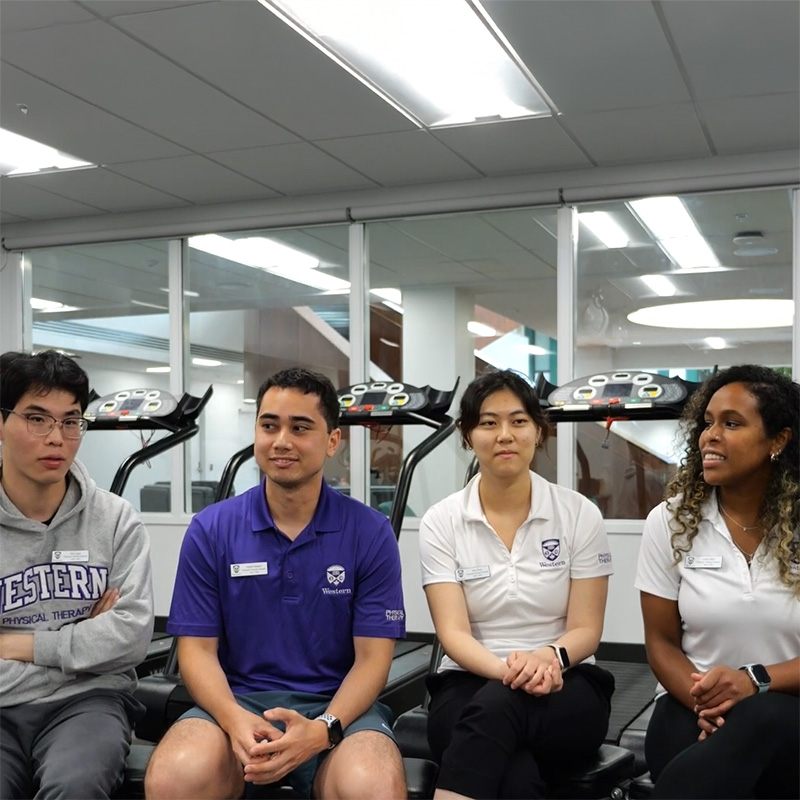 Four International Students sitting together.
