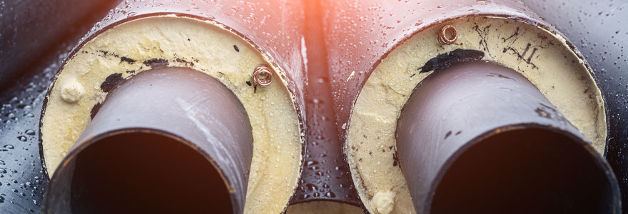 close up and cross section of two insulated pipes