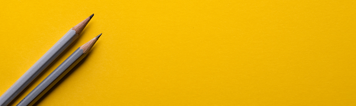 Decorative image of two pencils, set onto a yellow background.