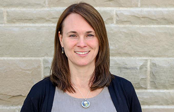 Image of Carrie Anne Marshall, looking toward the camera.