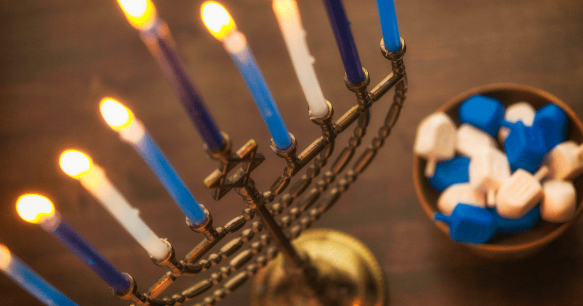 A hanukkah menorah lit up 