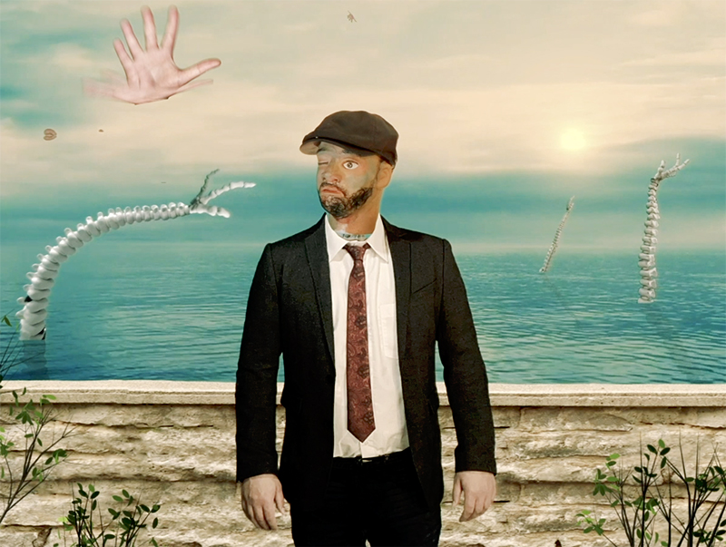 A computer generated scene showing a man in a suit with a distorted face standing in front of a body of water, with suspended verterbre in the background